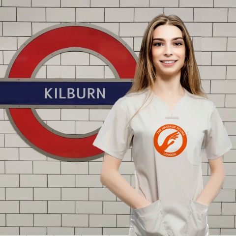 Massage therapist arriving at Kilburn Underground Station for a home visit.